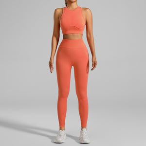 A woman figure, wearing a Pink/Pink Tight-Fitting Yoga Set wear, with the front side being displayed