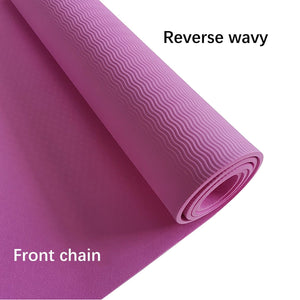 Large yoga mat with non-slip surface for fitness training - in use